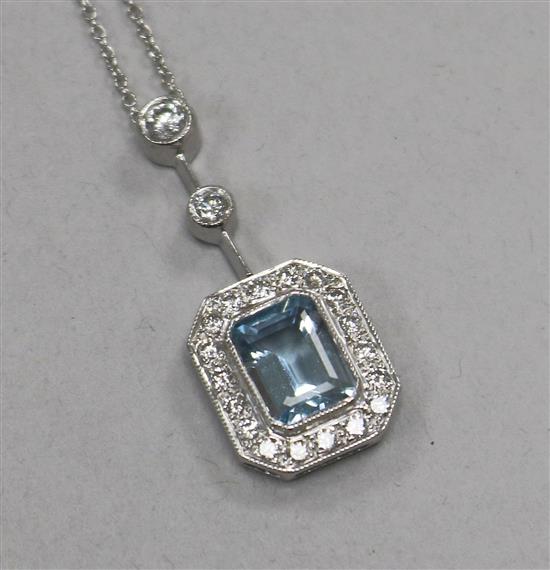 A modern Italian 18ct white gold, aquamarine and diamond set octagonal drop pendant, on a fine link chain, pendant 30mm.
